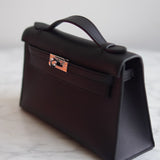 Bolsa Hermès Kelly Pochette Swift Noir com Ferragens Palladium