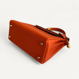 Bolsa Hermès Kelly 25 Togo Orange H com Ferragens Gold