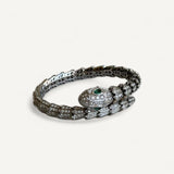 Pulseira Bvlgari Serpenti em Ouro Branco 18K cravejada com Pavê de Diamantes e dois Olhos de Esmeralda