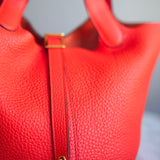 Bolsa Hermès Picotin 18 Clemence Orange com Ferragens Gold