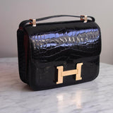 Bolsa Hermès Constance 24 Shiny Alligator Noir com Ferragens Gold