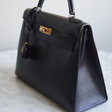 Bolsa Hermès Kelly 32 Taurillon Noir com Ferragens Gold