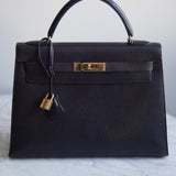 Bolsa Hermès Kelly 32 Taurillon Noir com Ferragens Gold