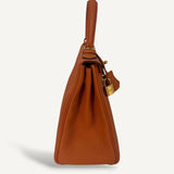 Bolsa Hermès Kelly 28 Togo Orange H com Ferragens Gold