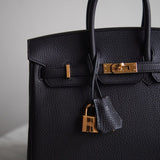 Bolsa Hermès Birkin 25 Togo Noir com Ferragens Gold