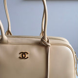 Bolsa Chanel Bowling Calfskin Bege Grande