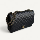 Bolsa Chanel Double Flap Maxi Preta com Ferragens Douradas