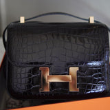 Bolsa Hermès Constance 24 Shiny Alligator Noir com Ferragens Gold