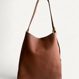 Bolsa Louis Vuitton Low Key Hobo MM Caramelo