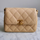 Bolsa Chanel Single Flap Caviar Bege Small com Gold Hardware