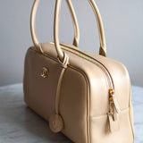Bolsa Chanel Bowling Calfskin Bege Grande