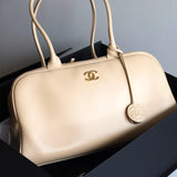 Bolsa Chanel Bowling Calfskin Bege Grande