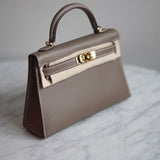 Bolsa Hermès Mini Kelly Epsom Etoupe com Ferragens Gold