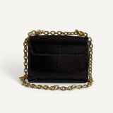 Bolsa Louis Vuitton Twist Phyton Preta com Ferragens Douradas Cravejadas