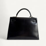 Bolsa Hermès Kelly 32 Calf Box Noir Vintage com Ferragens Gold