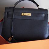 Bolsa Hermès Kelly 32 Taurillon Noir com Ferragens Gold