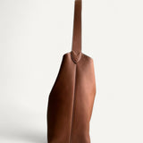 Bolsa Louis Vuitton Low Key Hobo MM Caramelo