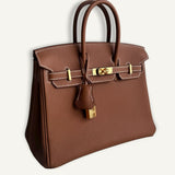 Bolsa Hermès Birkin 25 Togo Gold com Ferragens Gold