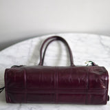 Bolsa Prada Bonnie Média Burgundy