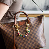 Bolsa Louis Vuitton Damier Ébène Belmont