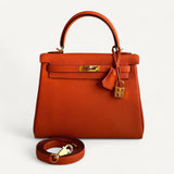 Bolsa Hermès Kelly 25 Togo Orange H com Ferragens Gold