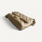 Bolsa Chanel Metallic Lambskin Lacquered Quilted Small Flap Gold