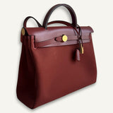 Bolsa Hermès Herbag 31 Rouge H com Ferragens Gold