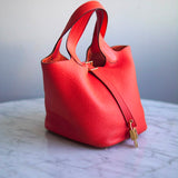 Bolsa Hermès Picotin 18 Clemence Orange com Ferragens Gold
