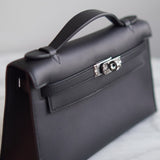 Bolsa Hermès Kelly Pochette Swift Noir com Ferragens Palladium