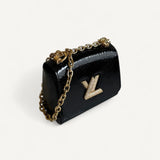Bolsa Louis Vuitton Twist Phyton Preta com Ferragens Douradas Cravejadas