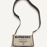 Bolsa Burberry Note Canvas Logo Crossbody