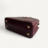  Bolsa Louis Vuitton Mini Capucine Croco Burgundy com Ferragens Douradas