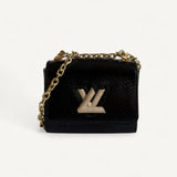 Bolsa Louis Vuitton Twist Phyton Preta com Ferragens Douradas Cravejadas
