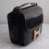 Bolsa Hermès Constance 24 Shiny Alligator Noir com Ferragens Gold