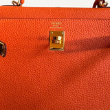 Bolsa Hermès Kelly 25 Togo Orange H com Ferragens Gold