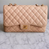 Bolsa Chanel Double Flap Caviar Jumbo Nude com Gold Hardware