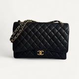 Bolsa Chanel Double Flap Maxi Preta com Ferragens Douradas