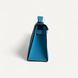 Bolsa Hermès Kelly Pochette Zanzibar com Ferragens Palladium