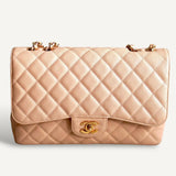 Bolsa Chanel Double Flap Caviar Jumbo Nude com Gold Hardware