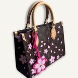Bolsa Louis Vuitton LV x TM Monogram Cherry Blossom On the go OM Sakura Brown