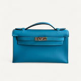 Bolsa Hermès Kelly Pochette Zanzibar com Ferragens Palladium
