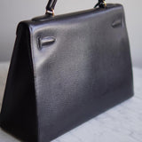 Bolsa Hermès Kelly 32 Taurillon Noir com Ferragens Gold