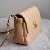 Bolsa Chanel Single Flap Caviar Bege Small com Gold Hardware