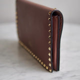 Bolsa Clutch Valentino Rockstud Tabacco