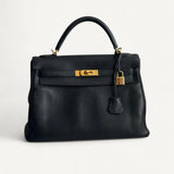 Bolsa Hermés Kelly 32 Togo Noir com Ferragens Gold