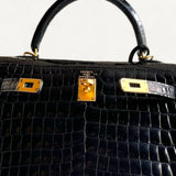 Bolsa Hermès Kelly 25 Crocodile Niloticus Shiny Noir com Ferragens Gold