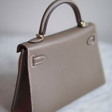 Bolsa Hermès Mini Kelly Epsom Etoupe com Ferragens Gold
