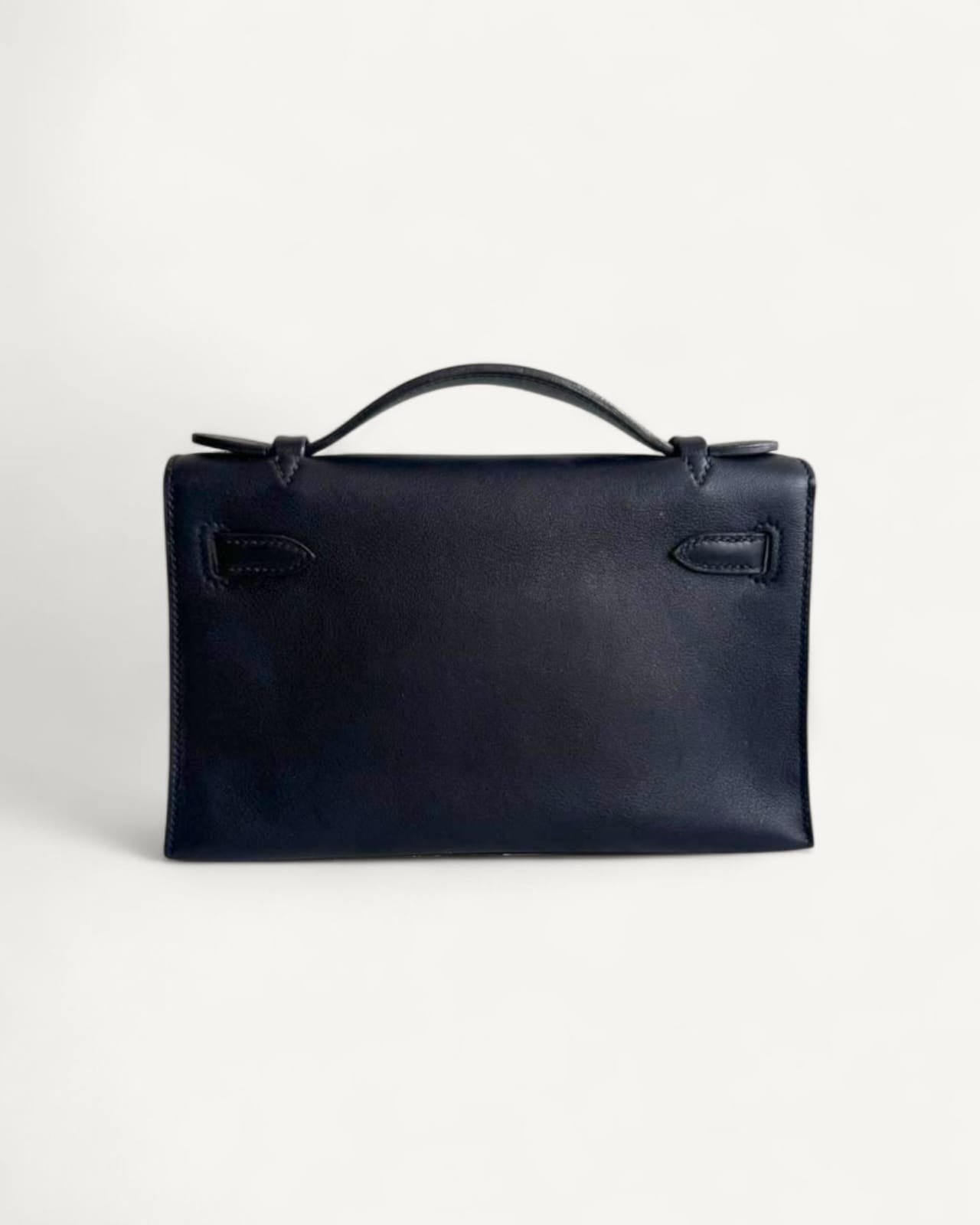 Bolsa Hermès Kelly Pochette Noir com Ferragens Palladium – Front Row