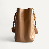 Bolsa Chanel Shopper Nude com Ferragens Douradas