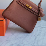 Bolsa Hermès Kelly 25 Togo Gold com Ferragens Gold